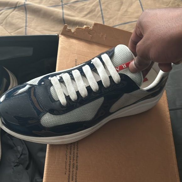 Hello I’m selling my Prada sneakers blue and white size 11.5 - Picture 2 of 3